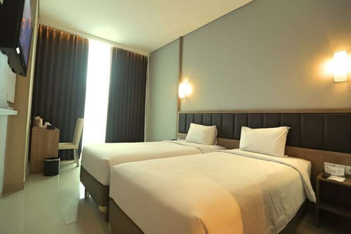 Imagen de la habitación del Hotel Pasar Baru Square. Foto 24