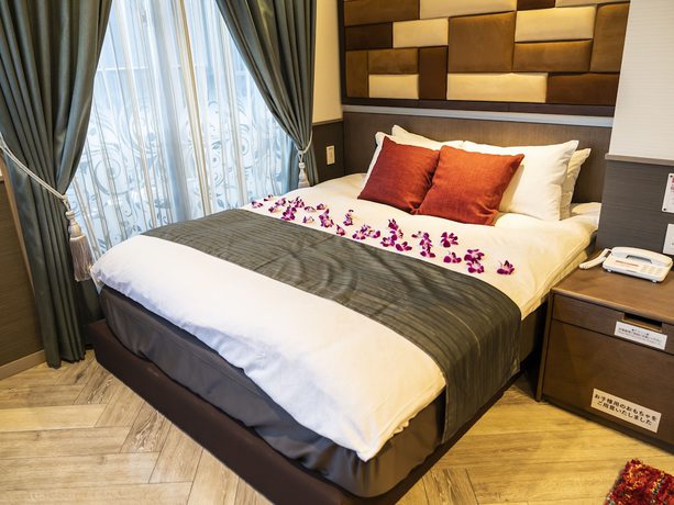 Imagen de la habitación del Hotel Pasela Living. Foto 16