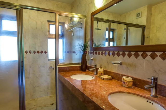 Imagen de la habitación del Hotel Paseo Del Sol Condohotel By Bric. Foto 2