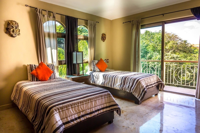 Imagen de la habitación del Hotel Paseo Del Sol Condohotel By Bric. Foto 13