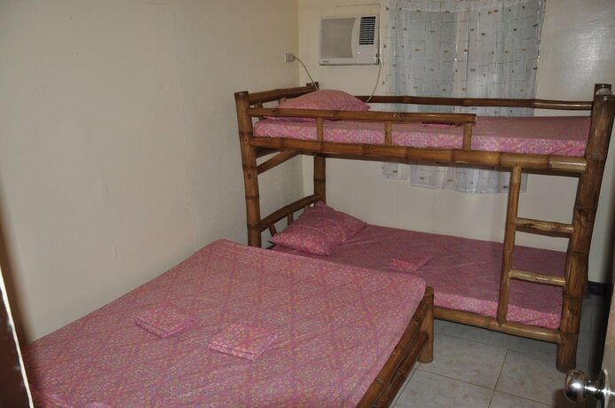 Imagen de la habitación del Hotel Paseo Verde Beach Resort. Foto 17