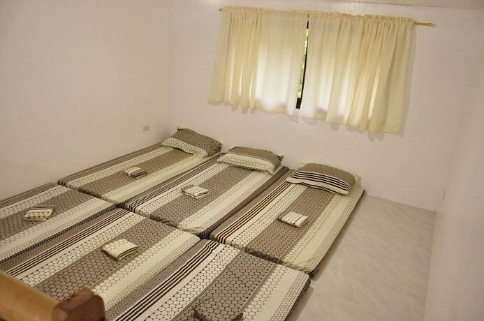 Imagen de la habitación del Hotel Paseo Verde Beach Resort. Foto 18