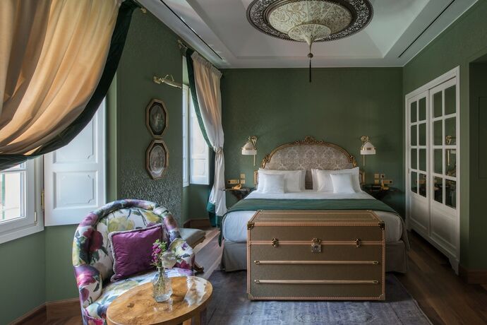 Imagen de la habitación del Hotel Passalacqua. Foto 11