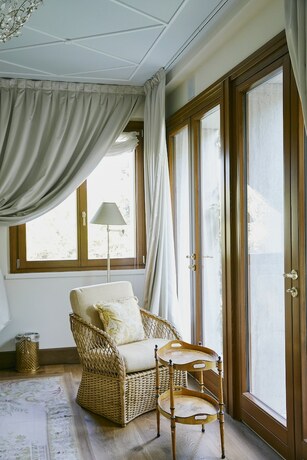 Imagen de la habitación del Hotel Passalacqua. Foto 18