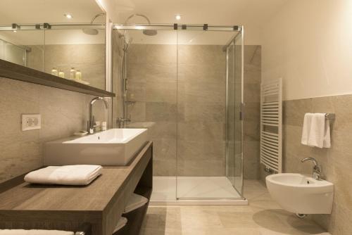 Imagen de la habitación del Hotel Passo Sella Dolomiti Mountain Resort. Foto 7