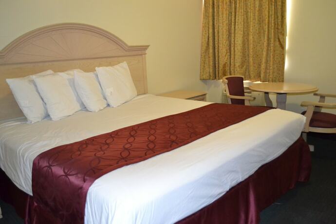 Imagen de la habitación del Hotel Passport Inn - By The Falls NY. Foto 15