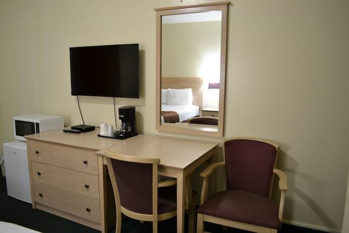 Imagen de la habitación del Hotel Passport Inn - By The Falls NY. Foto 16