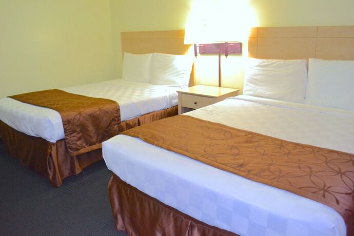 Imagen de la habitación del Hotel Passport Inn - By The Falls NY. Foto 18