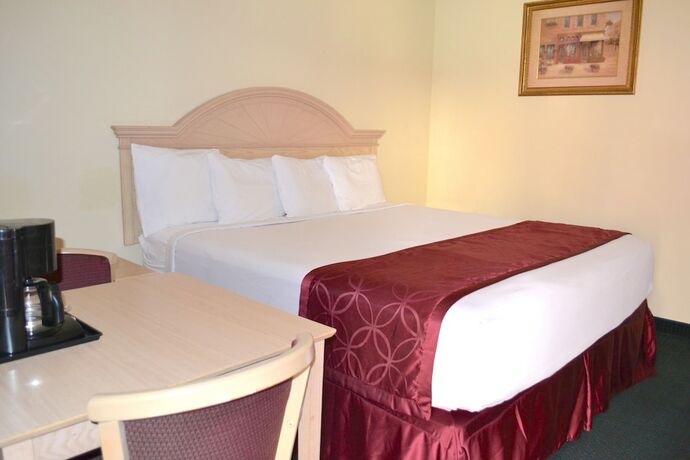 Imagen de la habitación del Hotel Passport Inn - By The Falls NY. Foto 19