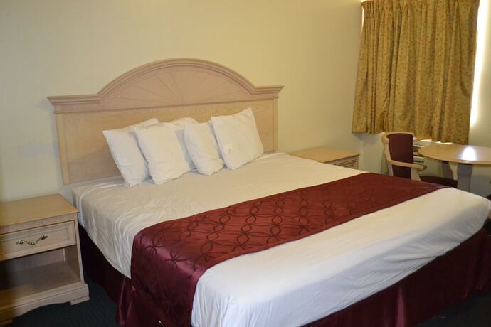 Imagen de la habitación del Hotel Passport Inn - By The Falls NY. Foto 20