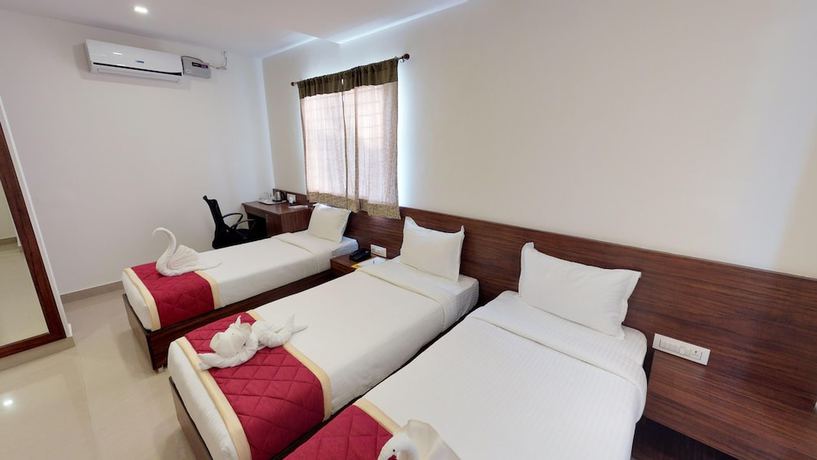 Imagen de la habitación del Hotel Passport Inn - Gateway to Comforts. Foto 12