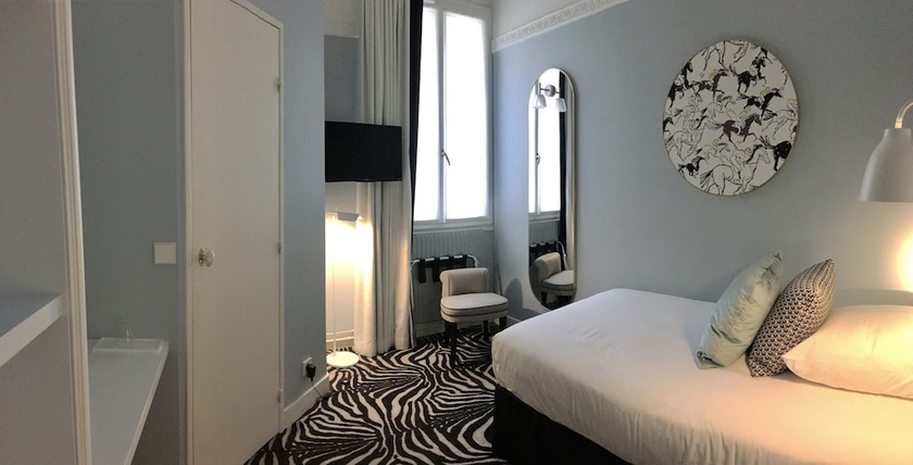 Imagen de la habitación del Hotel Pastel Paris. Foto 16