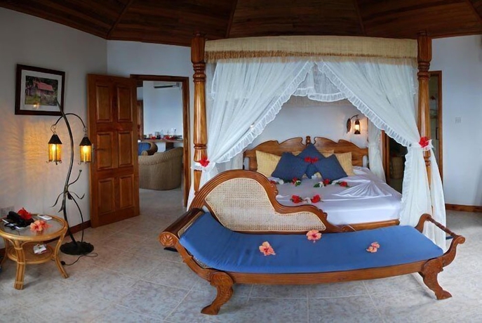 Imagen de la habitación del Hotel Patatran Village. Foto 16