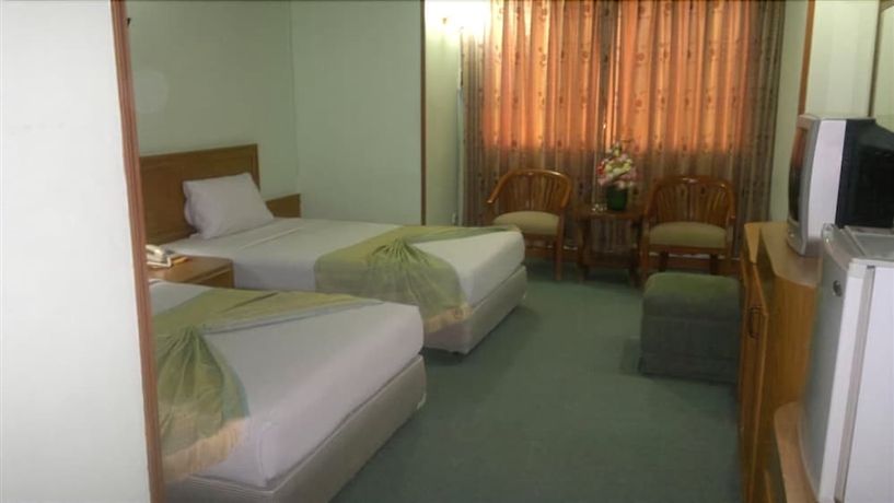 Imagen de la habitación del Hotel Pathumthani Place Hotel. Foto 6