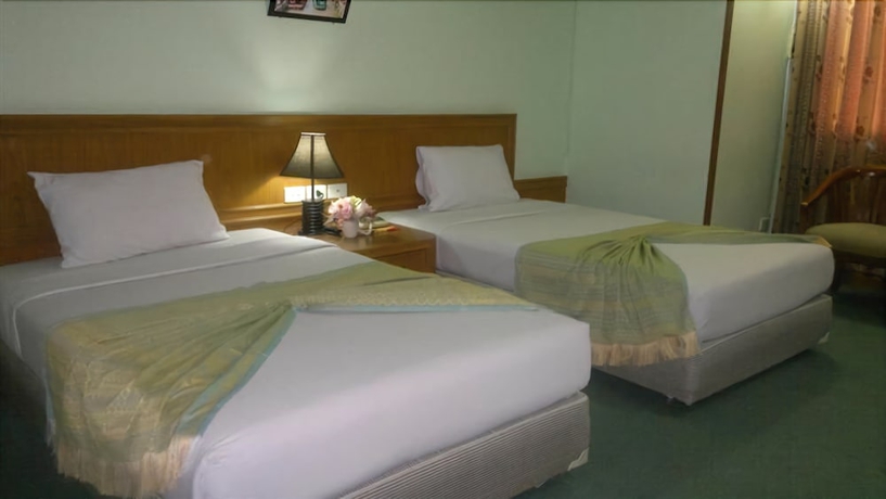 Imagen de la habitación del Hotel Pathumthani Place Hotel. Foto 7