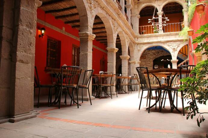 Imagen del bar/restaurante del Hotel Patio de Piedra Boutique. Foto 15