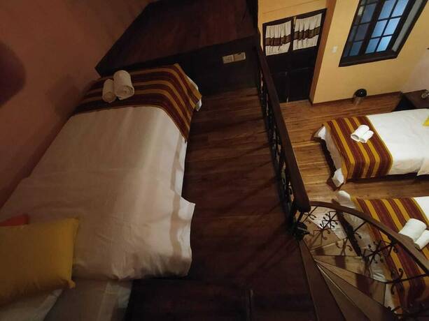 Imagen de la habitación del Hotel Patio de Piedra Boutique. Foto 19