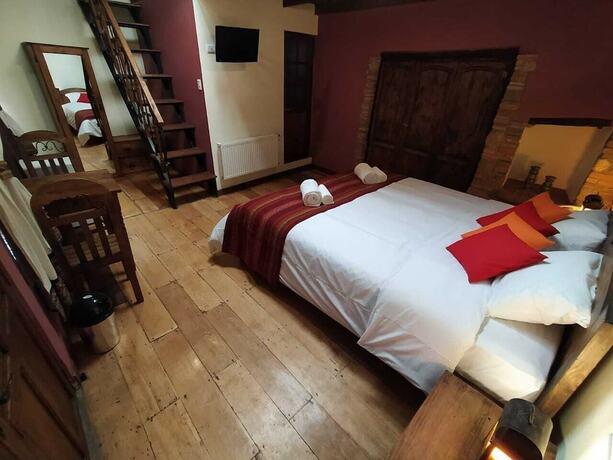 Imagen de la habitación del Hotel Patio de Piedra Boutique. Foto 21