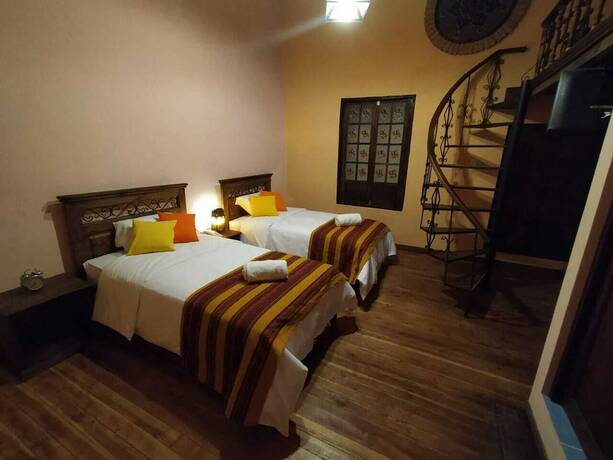 Imagen de la habitación del Hotel Patio de Piedra Boutique. Foto 22