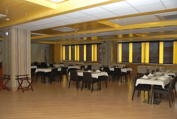 Imagen del bar/restaurante del Hotel Patliputra Exotica. Foto 5