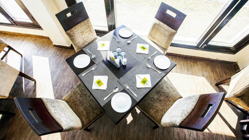 Imagen del bar/restaurante del Hotel Patnitop Heights. Foto 5