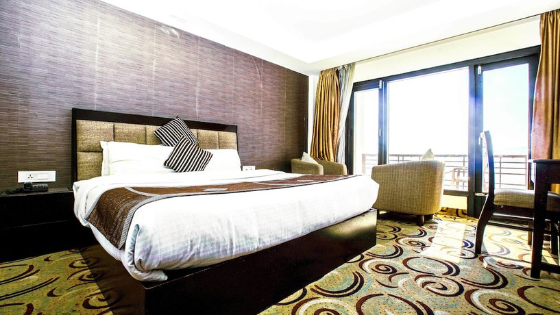 Imagen de la habitación del Hotel Patnitop Heights. Foto 12