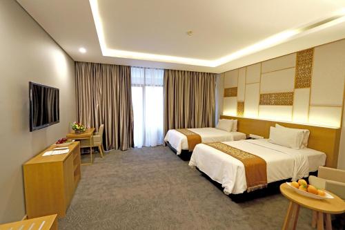 Imagen de la habitación del Hotel Patra Semarang Hotel and Convention. Foto 5
