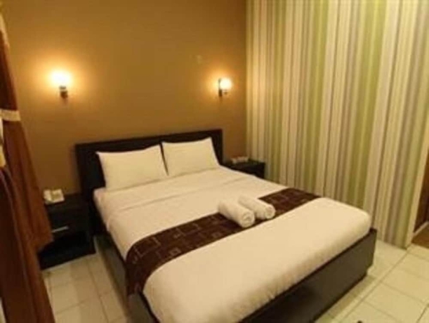 Imagen de la habitación del Hotel Patria Garden. Foto 7