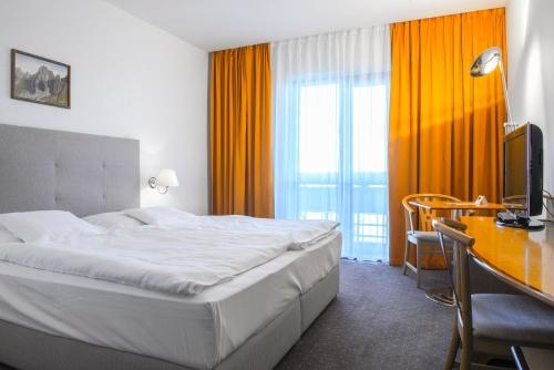 Imagen de la habitación del Hotel Patria, Strbske Pleso. Foto 6