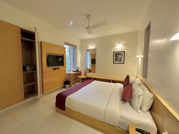 Imagen de la habitación del Hotel Patria Suites, Rajkot. Foto 4