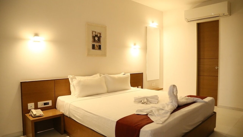 Imagen de la habitación del Hotel Patria Suites, Rajkot. Foto 9