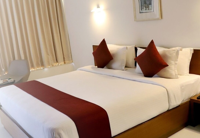 Imagen de la habitación del Hotel Patria Suites, Rajkot. Foto 10