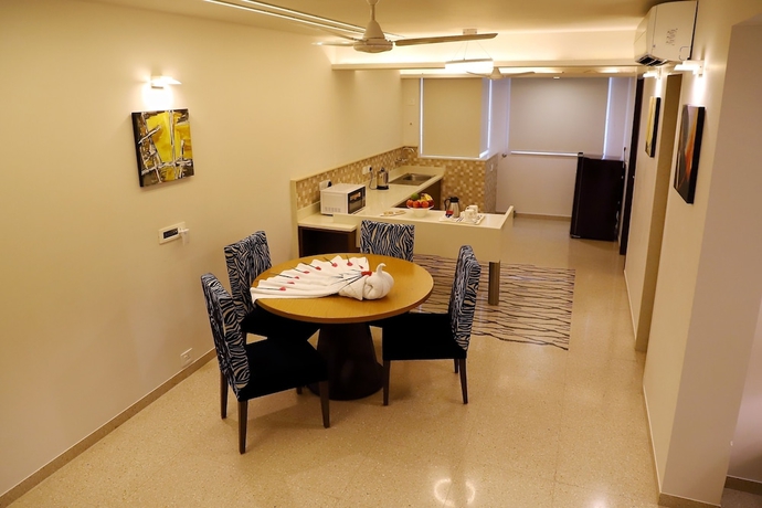 Imagen de la habitación del Hotel Patria Suites, Rajkot. Foto 12