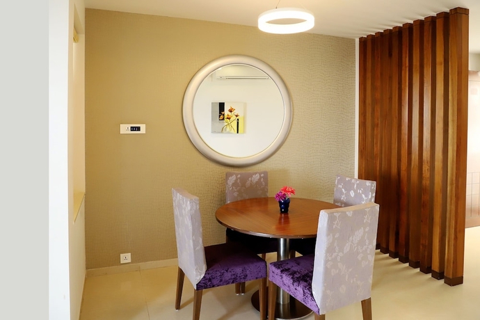 Imagen de la habitación del Hotel Patria Suites, Rajkot. Foto 18