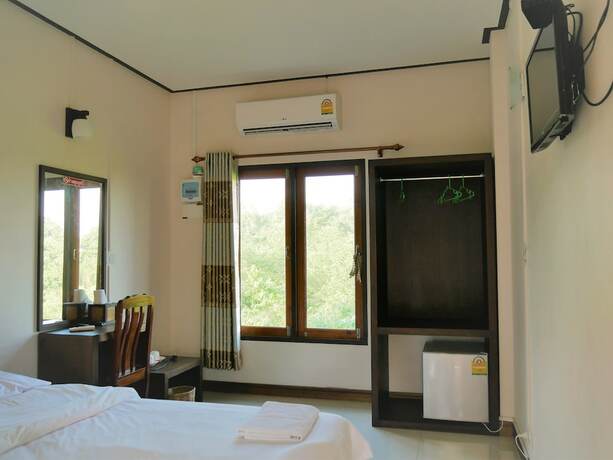 Imagen de la habitación del Hotel Pattana Resort. Foto 16
