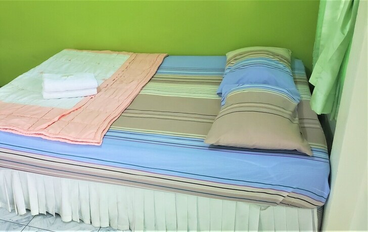 Imagen de la habitación del Hotel Pattaraporn. Foto 19