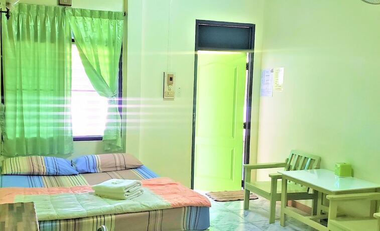 Imagen de la habitación del Hotel Pattaraporn. Foto 21