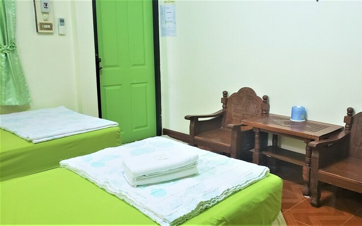 Imagen de la habitación del Hotel Pattaraporn. Foto 32