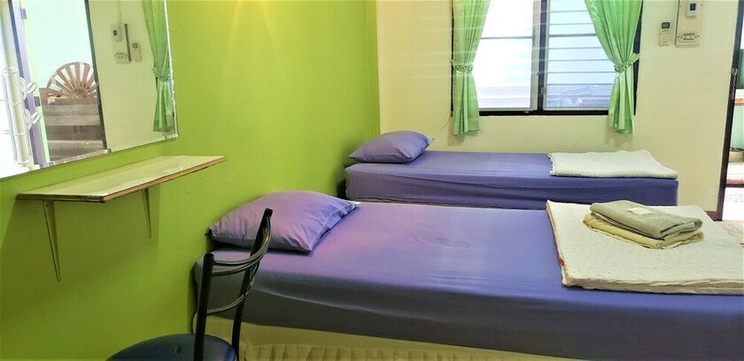 Imagen de la habitación del Hotel Pattaraporn. Foto 38