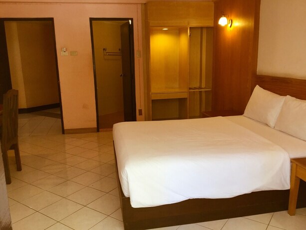 Imagen de la habitación del Hotel Pattaya At Nine. Foto 15