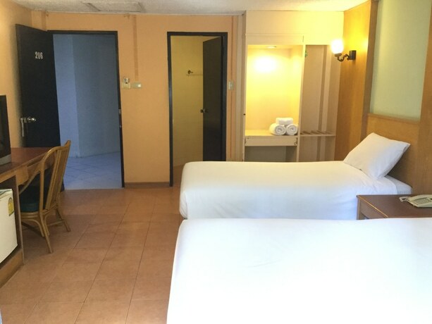 Imagen de la habitación del Hotel Pattaya At Nine. Foto 16