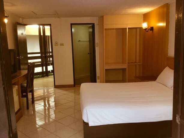 Imagen de la habitación del Hotel Pattaya At Nine. Foto 18