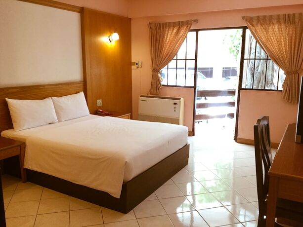 Imagen de la habitación del Hotel Pattaya At Nine. Foto 20