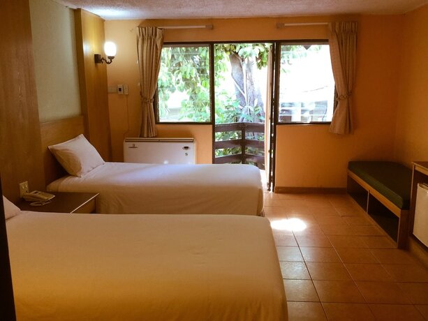 Imagen de la habitación del Hotel Pattaya At Nine. Foto 21