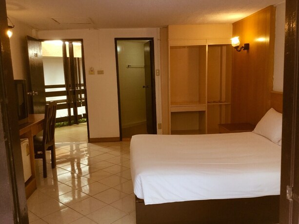Imagen de la habitación del Hotel Pattaya At Nine. Foto 22