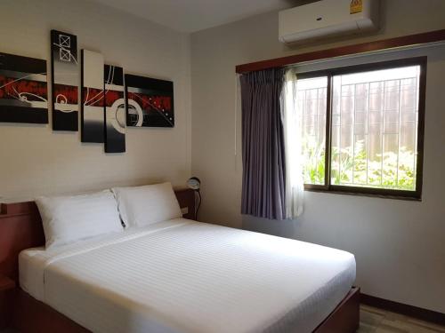 Imagen de la habitación del Hotel Pattaya Bed Boutique SHA. Foto 18