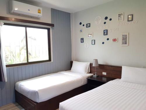 Imagen de la habitación del Hotel Pattaya Bed Boutique SHA. Foto 19