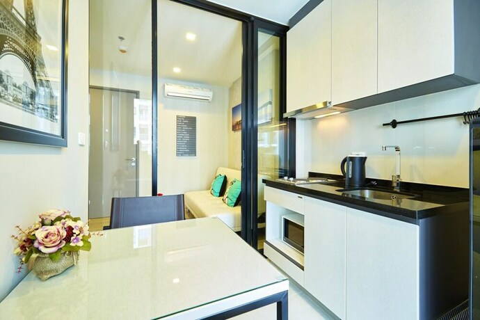 Imagen de la habitación del Hotel Pattaya Central Sea View Pool Suite. Foto 20