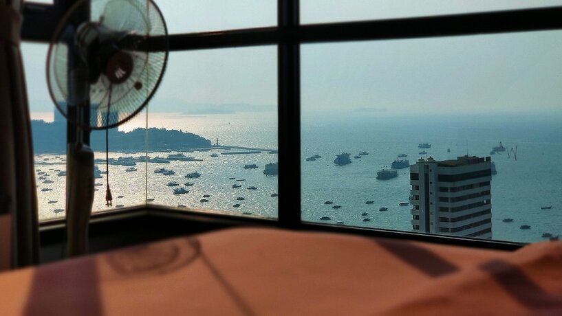 Imagen de la habitación del Hotel Pattaya Central Sea View Pool Suite. Foto 25