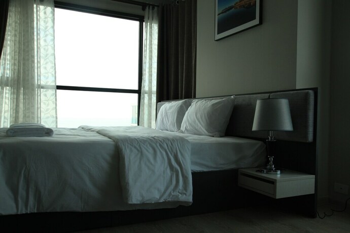 Imagen de los interiores del Hotel Pattaya Central Sea View Pool Suite. Foto 31